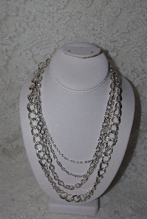 +MBAMG #11-769  "Silvertone 4 Strand Necklace"