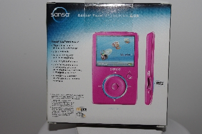 +MBAHB #003-117  " Pink Sansa SanDisk 4GB MP3 Player"