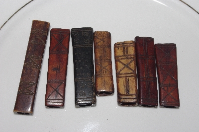 **MBAMG #T06-015  "Set Of 7 Hand Made Bone Beads"