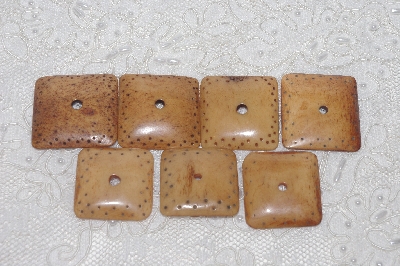 **MBAMG #T06-162  "1980's Set Of 7 Large Hand Made Bone Buttons"
