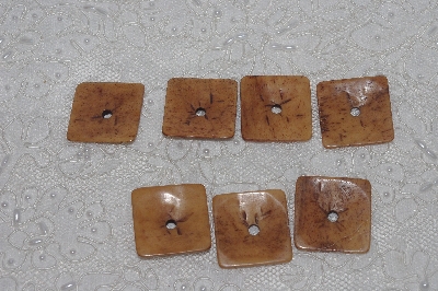 **MBAMG #T06-166  "1980's Set Of 7 Hand Made Bone Buttons"