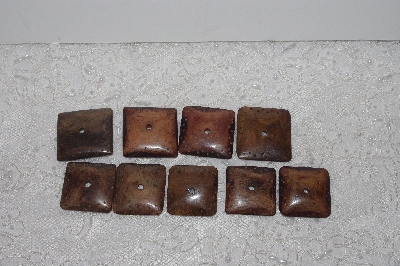 **MBAMG #T06-175  "1980's Set Of 9 Large Hand Made Bone Buttons"