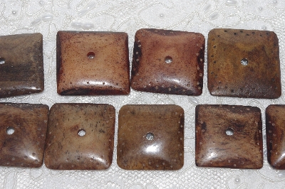 **MBAMG #T06-175  "1980's Set Of 9 Large Hand Made Bone Buttons"