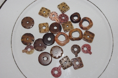 **MBAMG #T06-025  "1980's Set Of 24 Hand Made Bone Buttons"