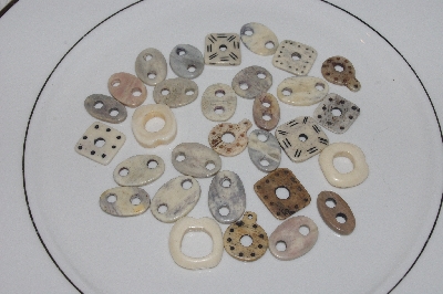 **MBAMG #T06-022  "1980's Set Of 30 Hand Made Bone Buttons"