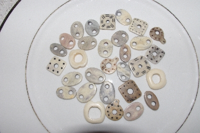 **MBAMG #T06-022  "1980's Set Of 30 Hand Made Bone Buttons"