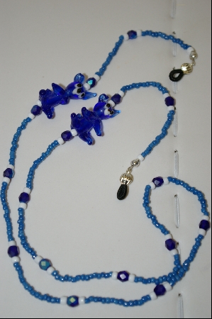 +MBA #583  "Funny Blue Glass Dogs"