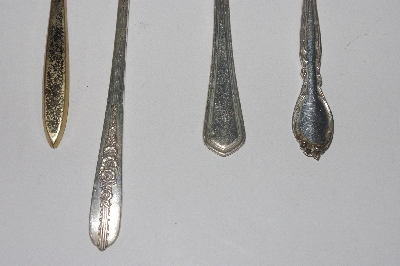 +MBAMG #00016-0045  "Vintage Set Of 4 Mixed Pattern Spoons"