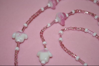 +MBA #2-141  "Breast Cancer Glass Beads"