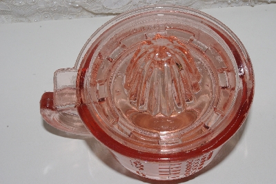 +MBAMG #108-0061  "Reproduction Pink Glass Reamer 3 in 1 Cup"