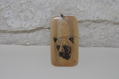 +MBACF #00010-0065  "1980's Signed Hand Carved Scrimshaw Bear Pendant"