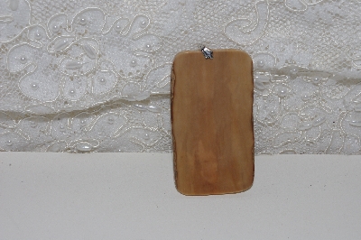 +MBACF #00010-0065  "1980's Signed Hand Carved Scrimshaw Bear Pendant"