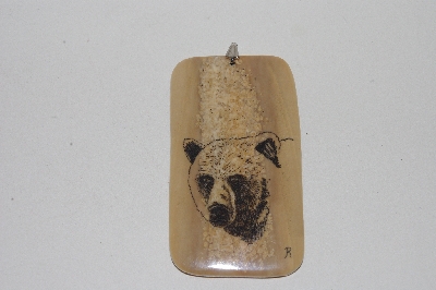 +MBACF #00010-0065  "1980's Signed Hand Carved Scrimshaw Bear Pendant"