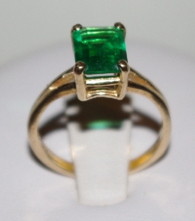 +MBA #1818-0153  "14K Yellow Gold Square Cut Green CZ Ring"