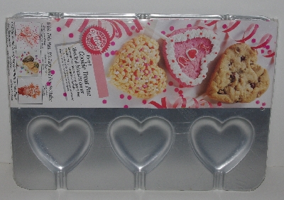 +MBA #2525-0022  "Set Of 4 1990's  Wilton Baking Pans"