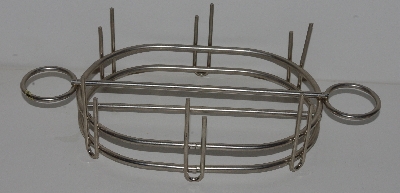 +MBA #2525-0277  "1990's Stainless Steel Baked Potato Holder"
