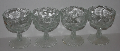 +MBA #2727-0401  "1980's Set Of 4 Clear Glass Fruit Patterned Large Stemed Desert Dishes" 