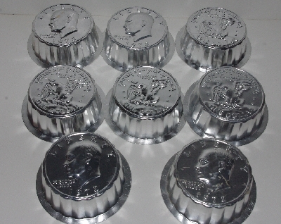 +MBA #3030-231    "Set Of 8 1972 & Liberty Tin Molds"