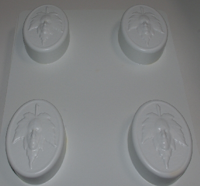 +MBA #3333-539   "Set Of 2 Leaf With Face 4 Part White Plastic Soap Molds"