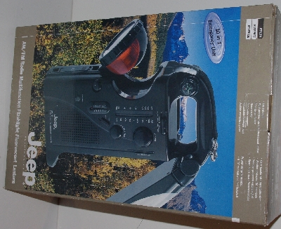 +MBA #3434-684   "2003 Jeep Am/Fm Radio All In One Multi Use Flashlight" 