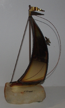 +MBA #3535-1110   "1975 Brass sail Boat Scupture By De Mott"