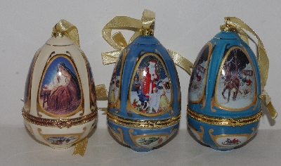 MBA #3535-623   "Set Of 3 Handcrafted Porcelain Christmas Themed Egg Ornaments"