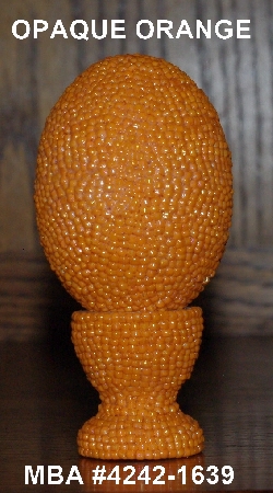 +MBA #4242-1638  "Opaque Luster Orange Glass Seed Bead Egg With Matching Egg Cup"