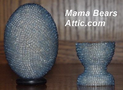 +MBA #5555-0100  "Pale Blue Glass Seed Bead Egg With Matching Egg Cup"