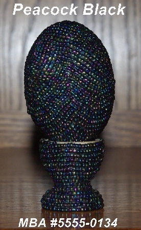+MBA #5555-0134  "Peacock Black Glass Seed Bead Egg With Matching Egg Cup"