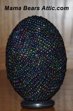 +MBA #5555-0134  "Peacock Black Glass Seed Bead Egg With Matching Egg Cup"