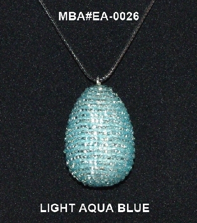 +MBA #EA-0026  "Light Aqua Blue Glass Bead Egg Pendant"