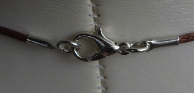 +MBA #EA-0064  "Brown Lined Glass Seed Bead Egg Pendant"