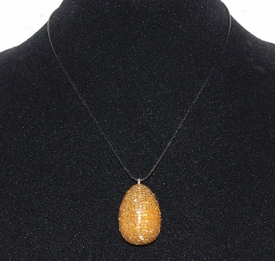 +MBA #EA-0101-  "Golden Luster Glass Seed Bead Egg Pendant"