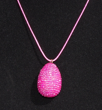 +MBA #AE3-0003  "Silver Lined Pink Glass Seed Bead Egg Pendant"