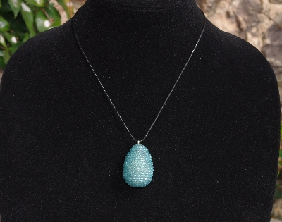 +MBA #AE3-0058  "3 Cut Aqua Blue Glass Seed Bead Egg Pendant"