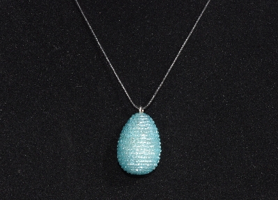 +MBA #AE3-0058  "3 Cut Aqua Blue Glass Seed Bead Egg Pendant"