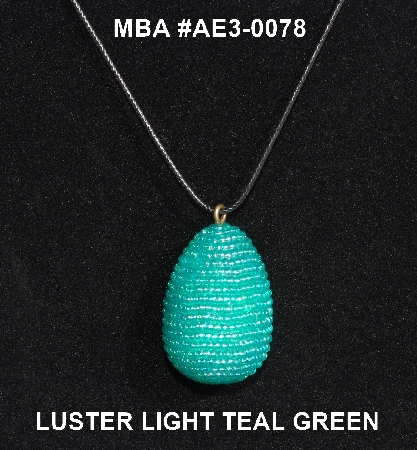 +MBA #AE3-0078  "Luster Light Teal Green Glass Seed Bead Egg Pendant"