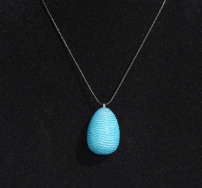 +MBA #AE3-0086  "Sky Blue Glass Seed Bead Egg Pendant"