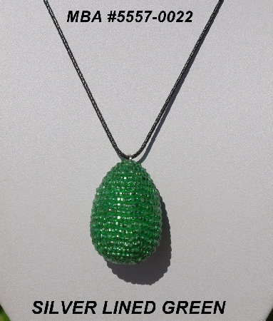 +MBA #5557-0022  "Silver Lined Green Glass Beaded Egg Pendant"