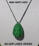 +MBA #5557-0022  "Silver Lined Green Glass Beaded Egg Pendant"
