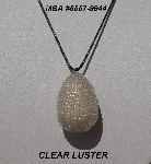 +MBA #5557-0044  "Clear Luster Glass Seed Bead Egg Pendant"
