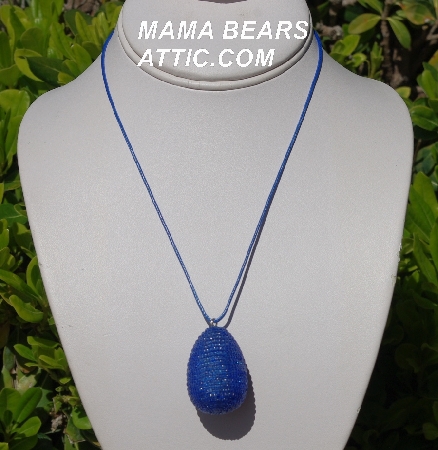 +MBA #5557-0049  "Luster Blue Glass Seed Bead Egg Pendant"