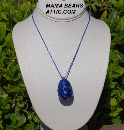 +MBA #5557-0063  "2 Cut Dark Blue Glass Seed Bead Egg Pendant"