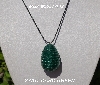 +MBA #5557-142  "2 Cut Darge Green Glass Seed Bead Egg Pendant"