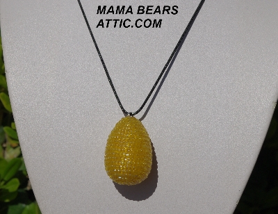 +MBA #5557-162  "3 Cut Yellow Glass Seed Bead Egg Pendant"