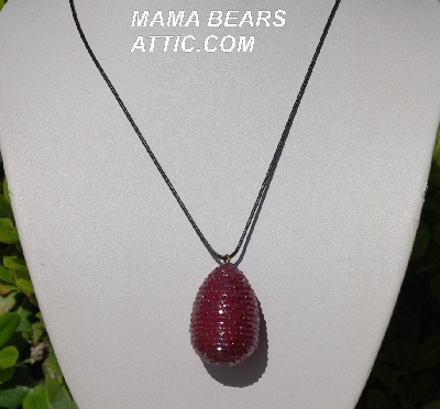 +MBA #5557-165  "2 Cut Ruby Red Glass Bead Egg Pendant"