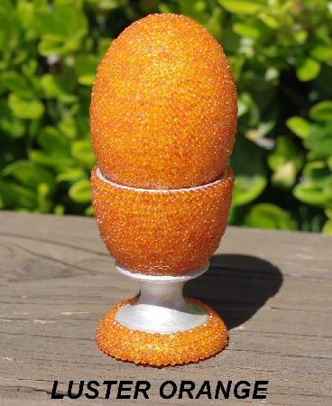 +MBA #5556-464  "Orange Luster Glass Seed Bead Egg With Matching Egg Cup