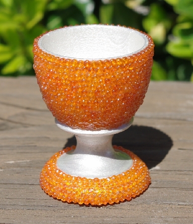 +MBA #5556-464  "Orange Luster Glass Seed Bead Egg With Matching Egg Cup