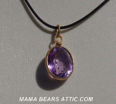 +MBA #5600-328  "Bezel Set Fancy Cut Oval Amethyst Pendant With 18" Black Cord"