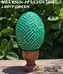 +MBA #5604-86  "Light Green Glass Bead Egg With Stand"